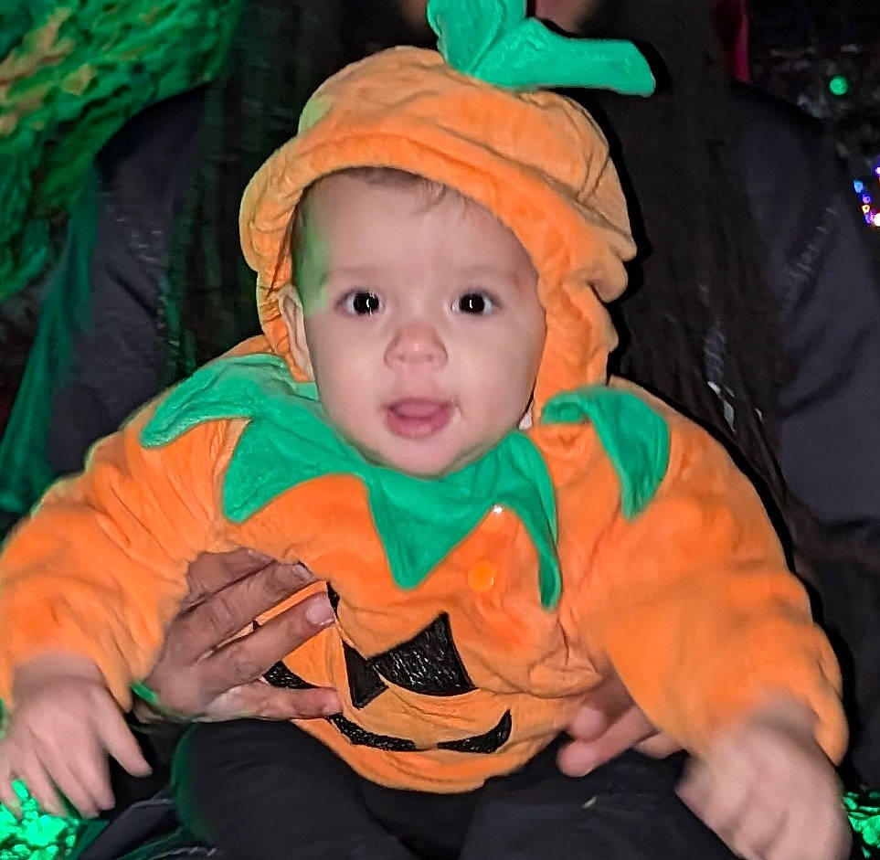 Zora is registered to the contest to win money with this photo: baby, babylaughing, bodypart, bonnet, clothing, coat, face, finger, hand, happy, hat, head, hood, hoodie, jacket, knitwear, person, photography, portrait, sweater