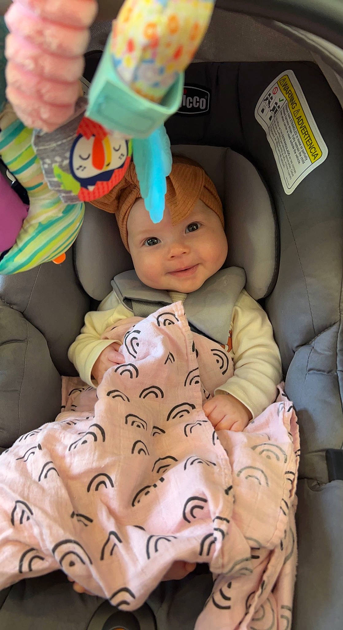 Stevi joined the competition — help win amazing prizes! baby, baby_in_car_seat, baby_products, baby_safety, baby_sleeping, baby_toddler_clothing, car_seat, cheek, child, comfort, finger, gesture, headwear, linens, mouth, person, plastic_bottle, product, skin, smile