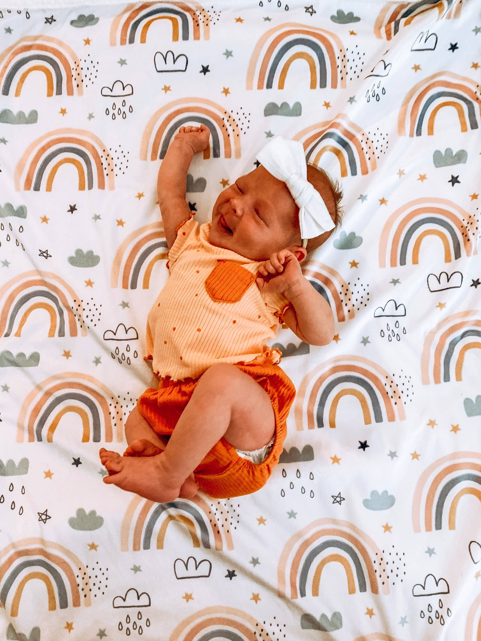 Stevi is registered to the contest to win money with this photo: art, baby, baby_toddler_clothing, child, circle, font, graphics, happy, human_body, illustration, pattern, peach, person, product, room, shorts, sitting, thigh, toddler, visual_arts