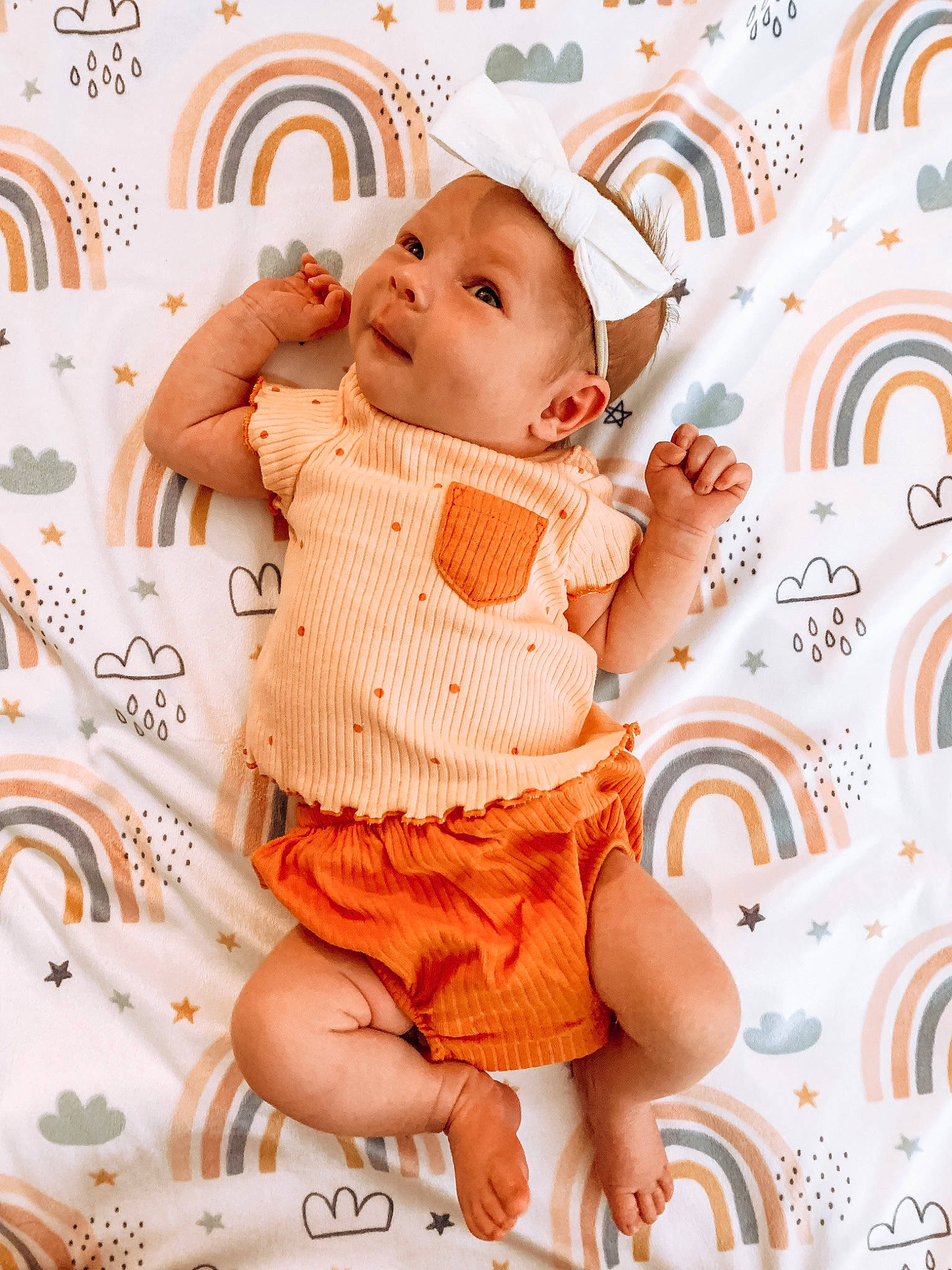 Stevi is registered to the contest to win money with this photo: baby, baby_sleeping, baby_toddler_clothing, beauty, cheek, child, comfort, facial_expression, happy, human_body, linens, pattern, person, pink, product, skin, sleeve, textile, thigh, toddler