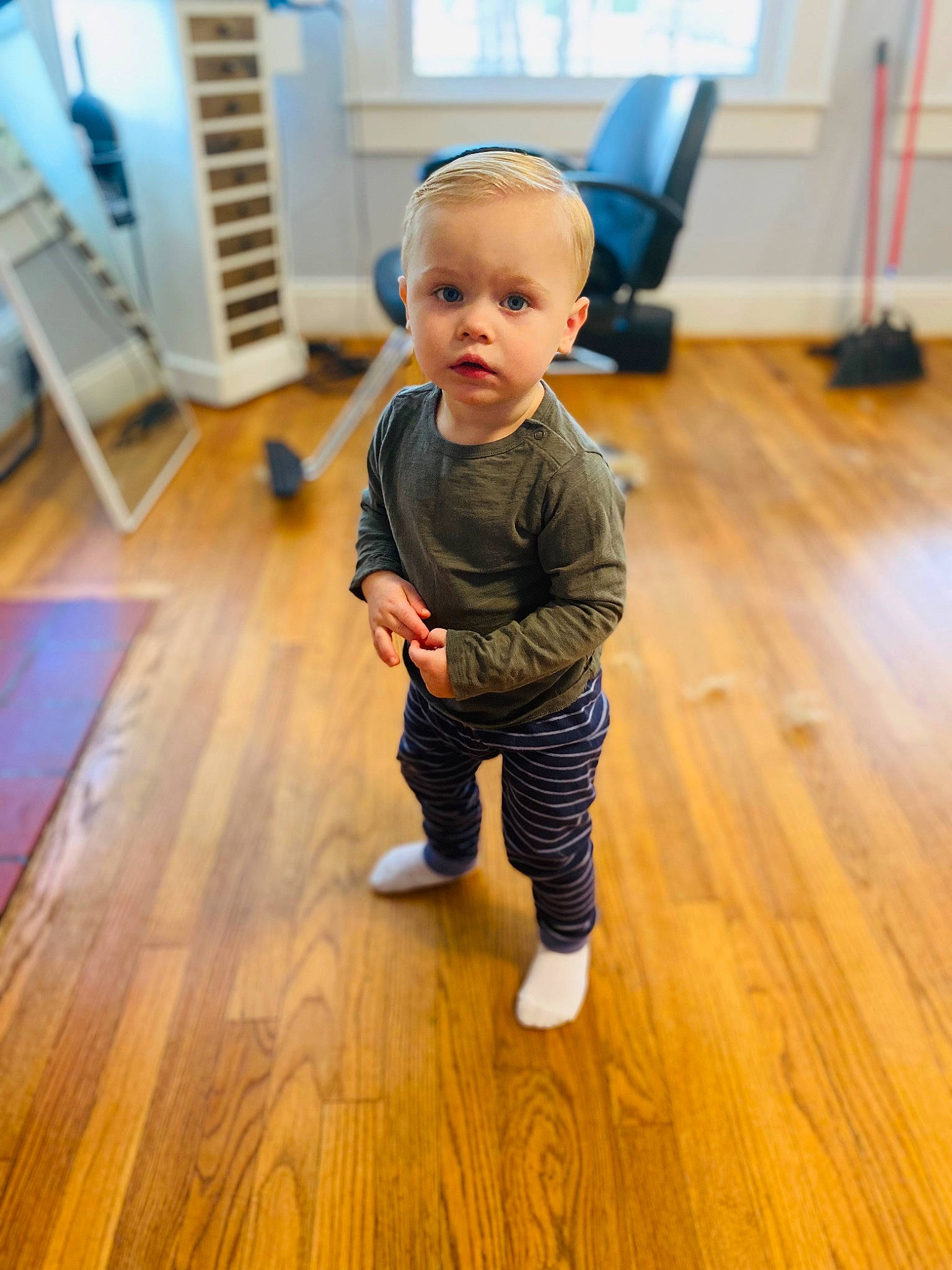Zane is registered to the contest to win money with this photo: baby, baby_toddler_clothing, child, cleanliness, door, floor, flooring, fun, hardwood, laminate_flooring, person, plank, plywood, room, sleeve, t_shirt, toddler, varnish, wood, wood_flooring