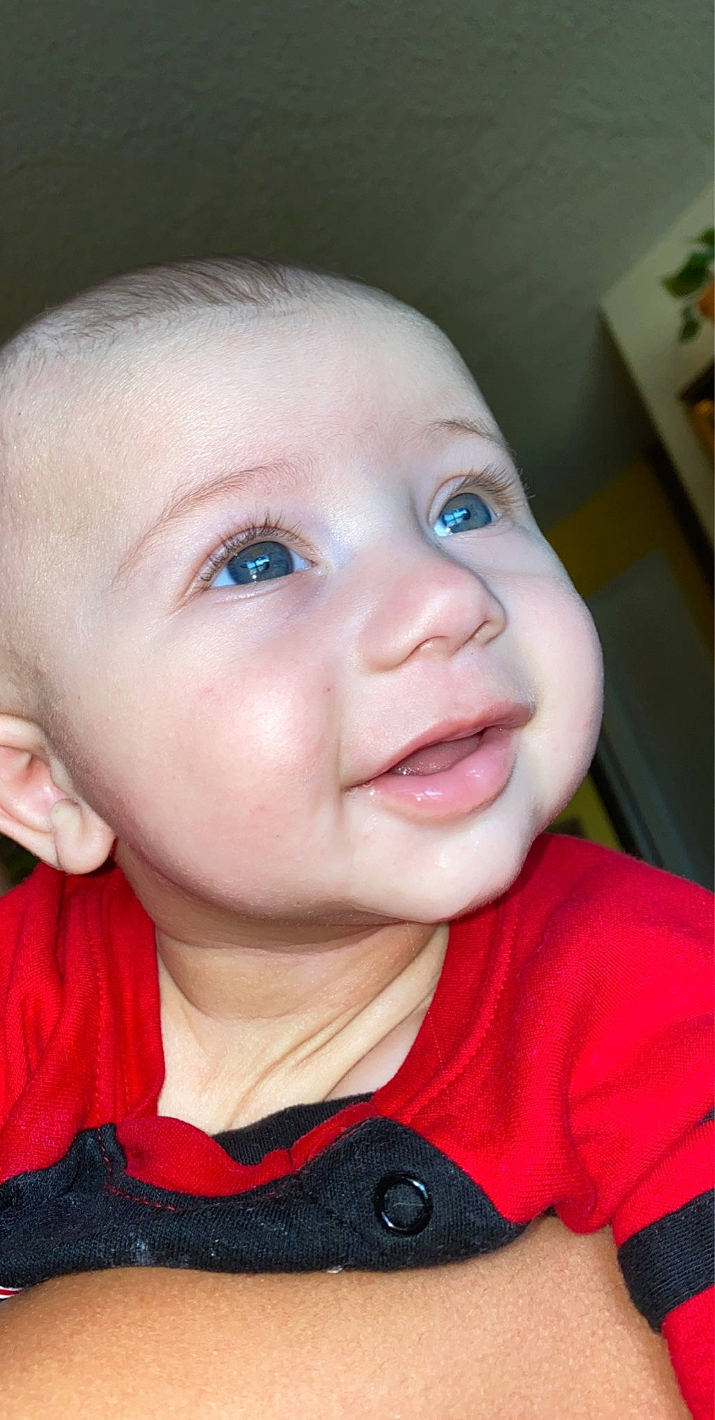 Amani is registered to the contest to win money with this photo: baby, cheek, child, chin, close_up, ear, eye, eyebrow, face, facial_expression, forehead, hair, head, iris, lip, mouth, nose, person, skin, smile