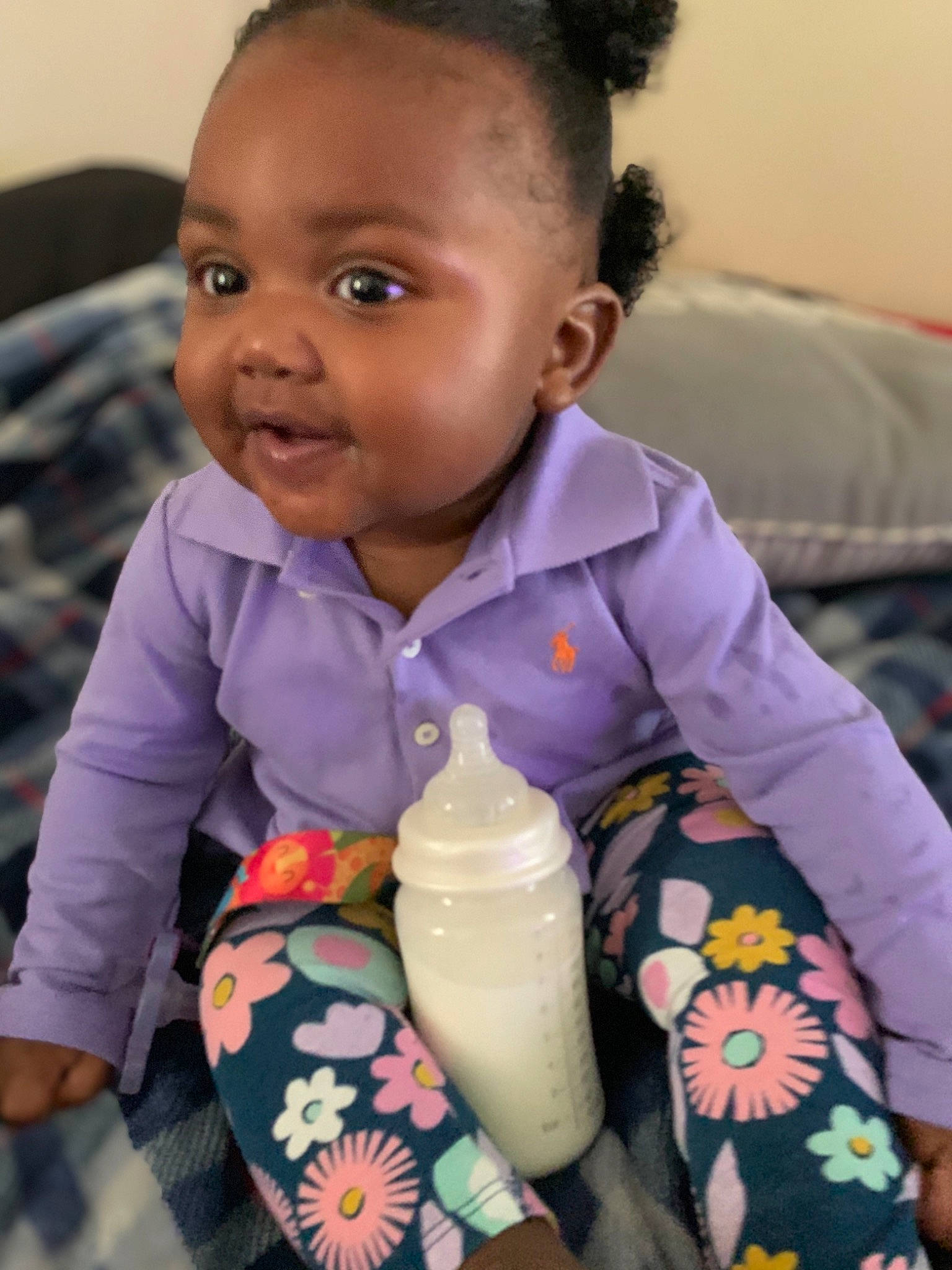 Nyomi is registered to the contest to win money with this photo: baby, baby_bottle, baby_products, baby_toddler_clothing, bottle, cheek, child, dreadlocks, ear, eye, face, mouth, nose, person, plastic_bottle, pottery, s_curl, toddler