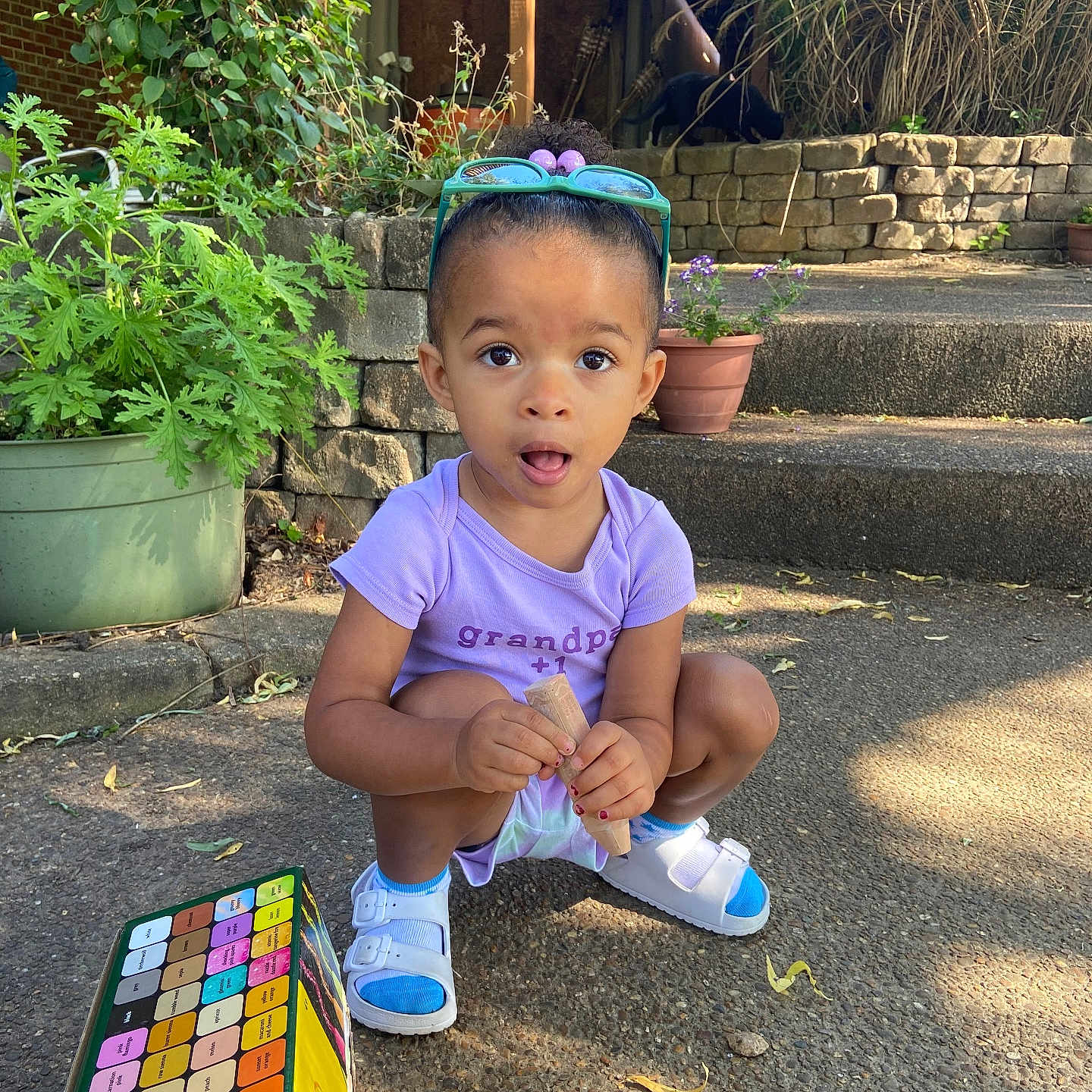 Amirah is registered to the contest to win money with this photo: backyard, clothing, face, footwear, head, herbal, herbs, jar, nature, outdoors, person, photography, plant, planter, portrait, pottedplant, pottery, shoe, soil, vase