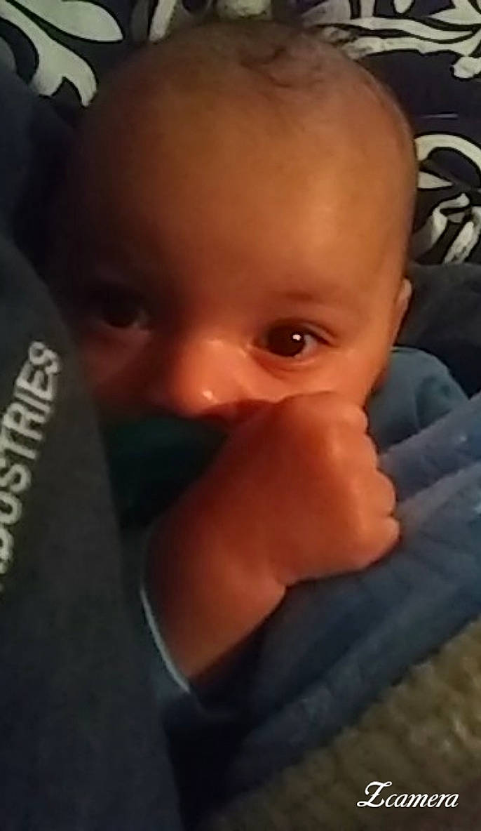 Korbyn is registered to the contest to win money with this photo: boy, cheek, child, chin, day, eye, eyebrow, face, facial_expression, finger, forehead, hair, hand, head, human_hair_color, infant, mouth, nose, person, skin