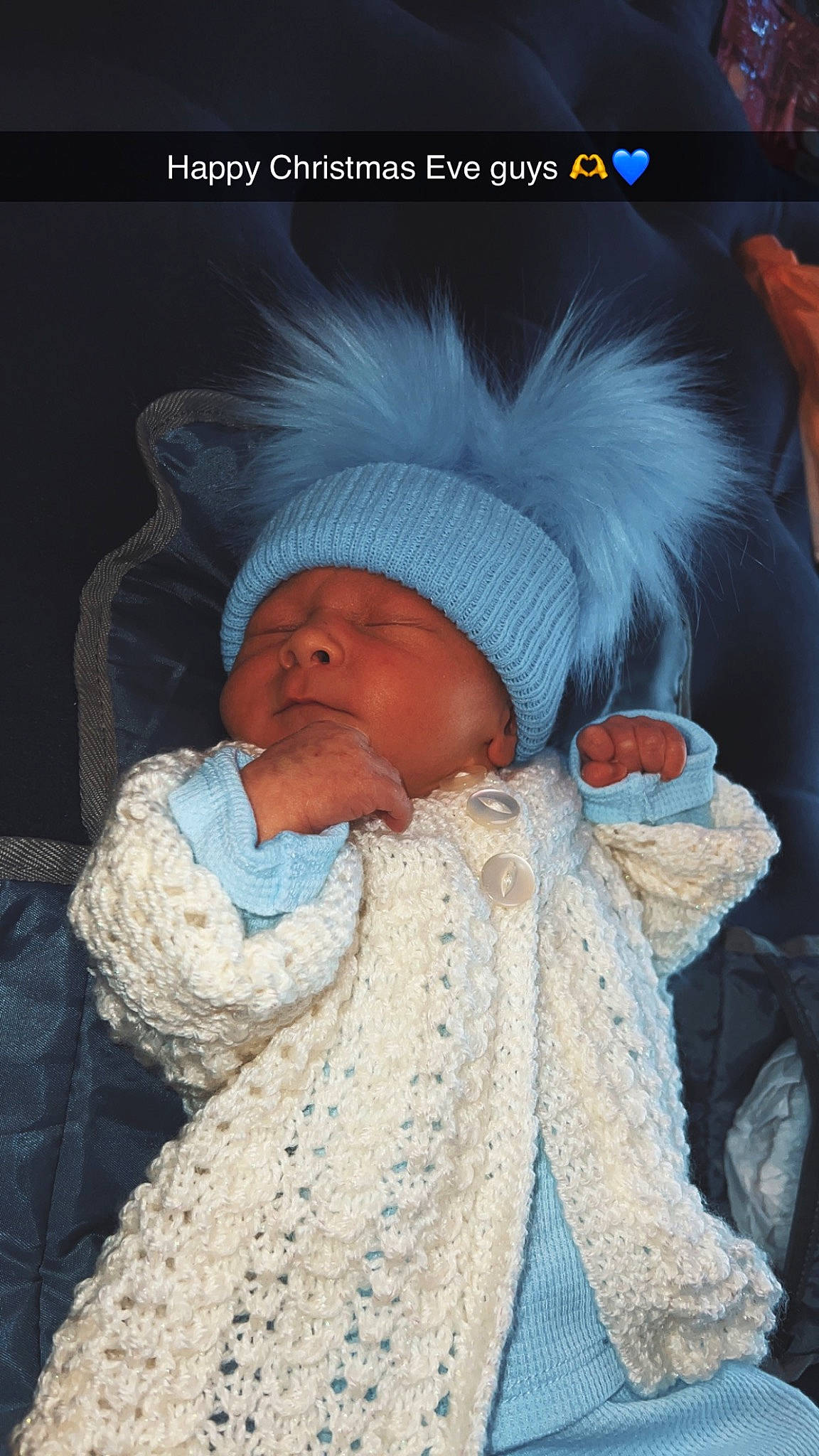 Malachi joined the competition — help win amazing prizes! art, baby, baby_sleeping, baby_toddler_clothing, beanie, cap, child, comfort, fur, illustration, knit_cap, linens, person, photo_caption, toddler, winter, wool, woolen