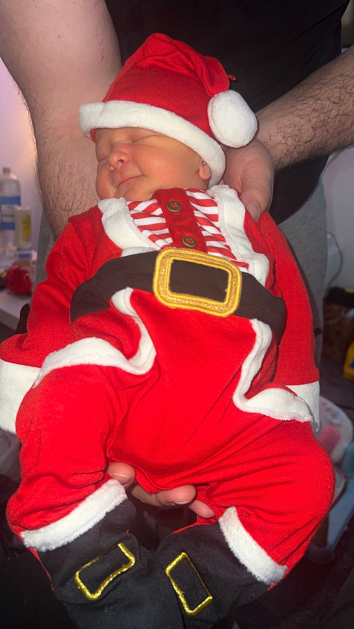 Malachi joined the competition — help win amazing prizes! baby, baby_toddler_clothing, cap, child, christmas, christmas_eve, comfort, costume_hat, event, fictional_character, hat, headwear, holiday, human_leg, lap, person, red, santa_claus, sleeve, sock