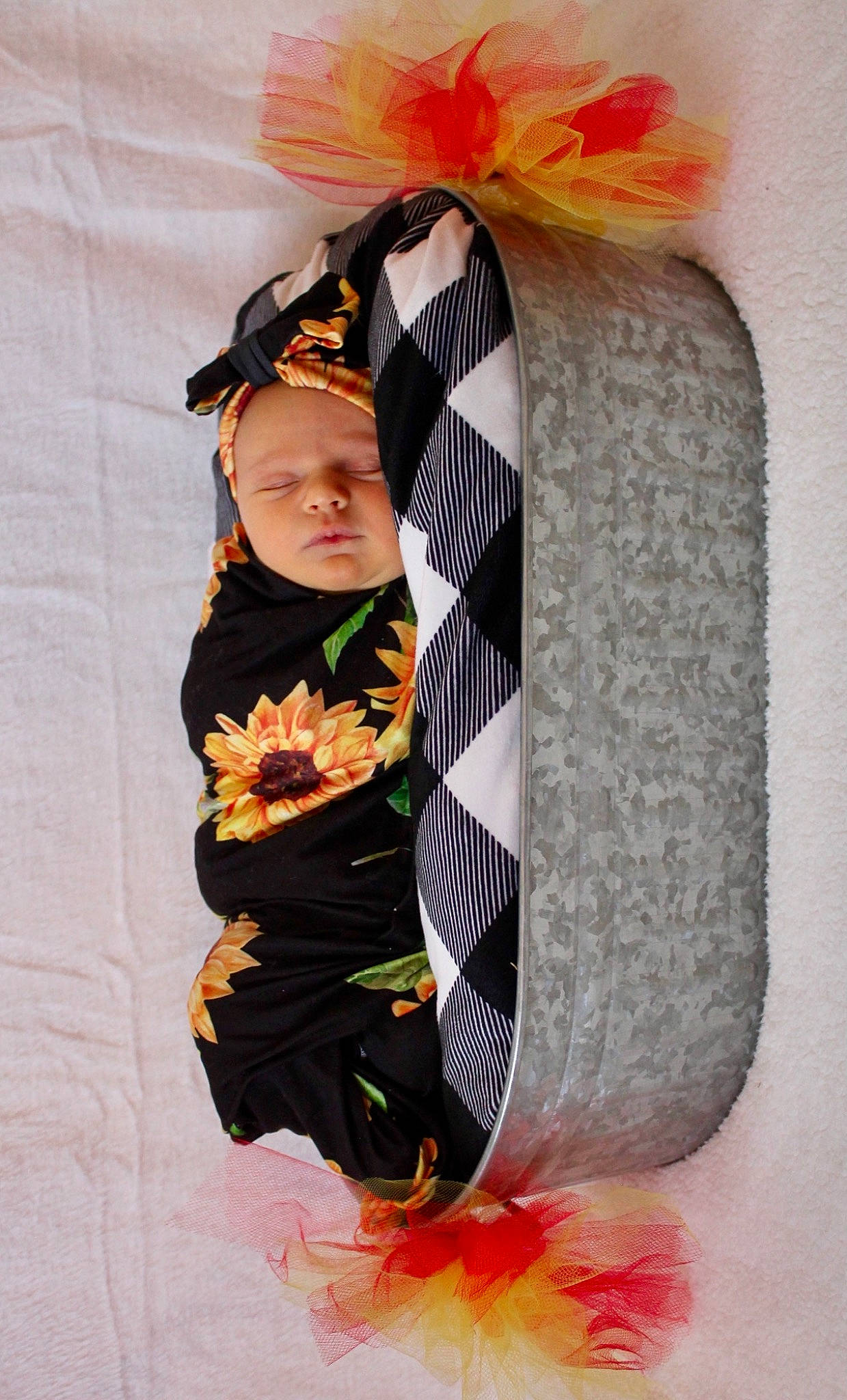 Vera is registered to the contest to win money with this photo: baby_products, beanie, child, costume, fashion_accessory, fashion_design, font, fur, glove, headgear, hood, hoodie, jacket, person, personal_protective_equipment, room, sitting, sleeve, textile, toddler