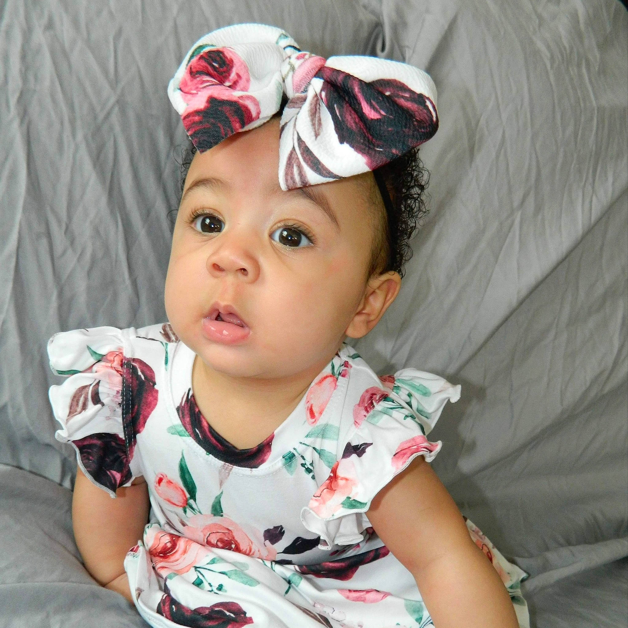 Arabella joined the competition — help win amazing prizes! baby, baby_toddler_clothing, cheek, child, clothing, cool, ear, fashion_accessory, hair_accessory, hat, head, headband, headgear, headpiece, headwear, person, pink, plant, surprise, toddler