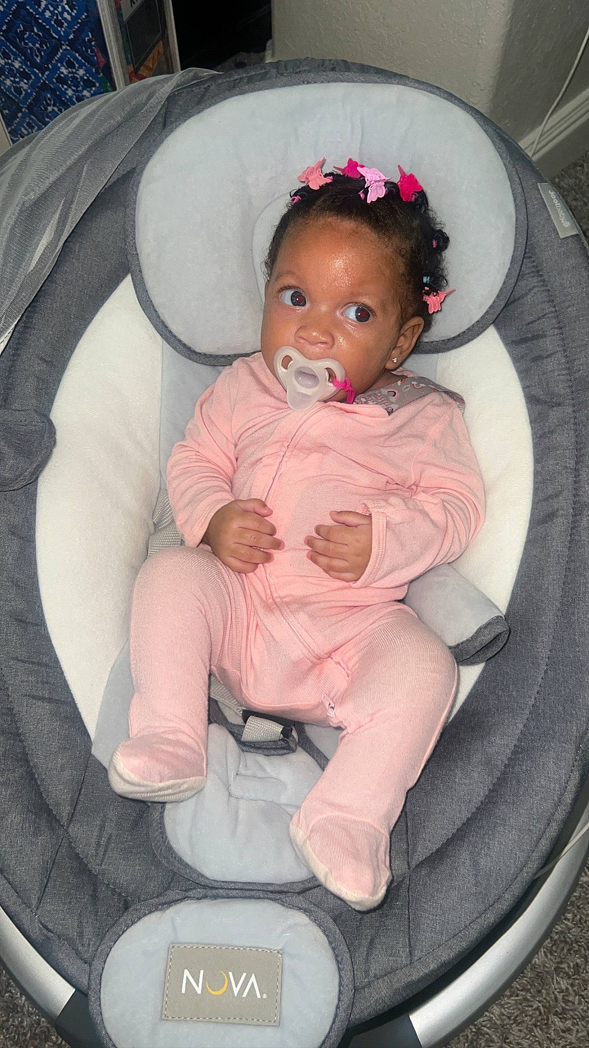 Amira is registered to the contest to win money with this photo: baby, baby_carriage, baby_products, baby_safety, baby_toddler_clothing, baby_toys, car_seat, chair, cheek, child, circle, comfort, fashion_accessory, fun, lap, pattern, person, pink, sitting, toddler