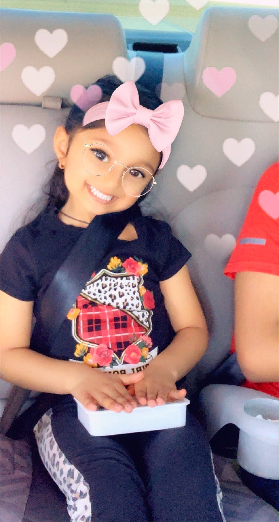 Tanya Shah is registered to the contest to win money with this photo: child, doll, event, facial_expression, fashion_design, friendship, fun, happy, headgear, headwear, jewellery, joy, necklace, party_supply, pattern, person, pink, plaid, smile, t_shirt