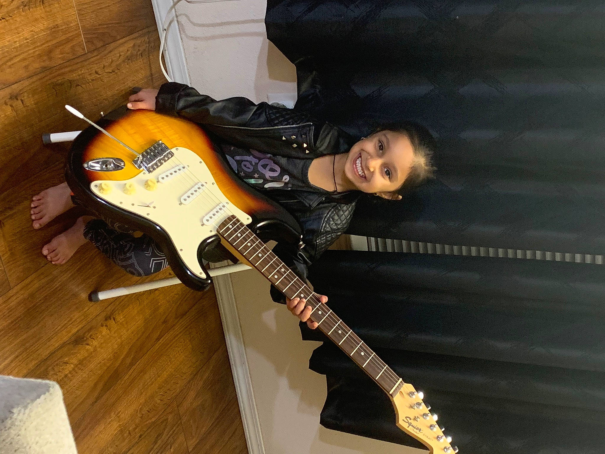 Tanya Shah is registered to the contest to win money with this photo: bass_guitar, electric_guitar, electronic_instrument, electronic_musical_instrument, event, folk_instrument, guitar, guitar_accessory, guitarist, joy, music, music_artist, musical_instrument, musical_instrument_accessory, musician, person, plucked_string_instruments, smile, string_instrument, string_instrument_accessory