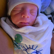 Landyn joined the competition — help win amazing prizes! newborn, baby, sleeping, hat, blanket, pacifier, infant, cozy, wrapped, soft, cute, closeup, face, peaceful, indoors, child, adorable, warm, resting, portrait