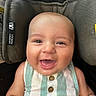 Bodie joined the competition — help win amazing prizes! baby, smiling, infant, car_seat, child, happy, face, person, clothing, button, striped, seat, protection, cute, expression, sitting, young, skin, head, eyes
