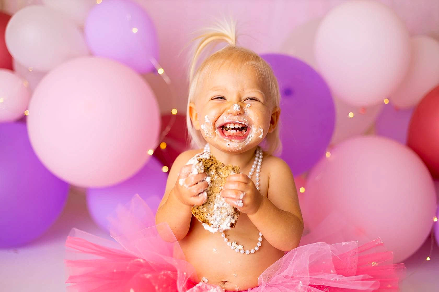 Lucy joined the competition — help win amazing prizes! balloon, dress, facial_expression, finger, flash_photography, fun, happy, head, human, joy, lighting, magenta, organ, party_supply, people, person, photograph, pink, purple, smile