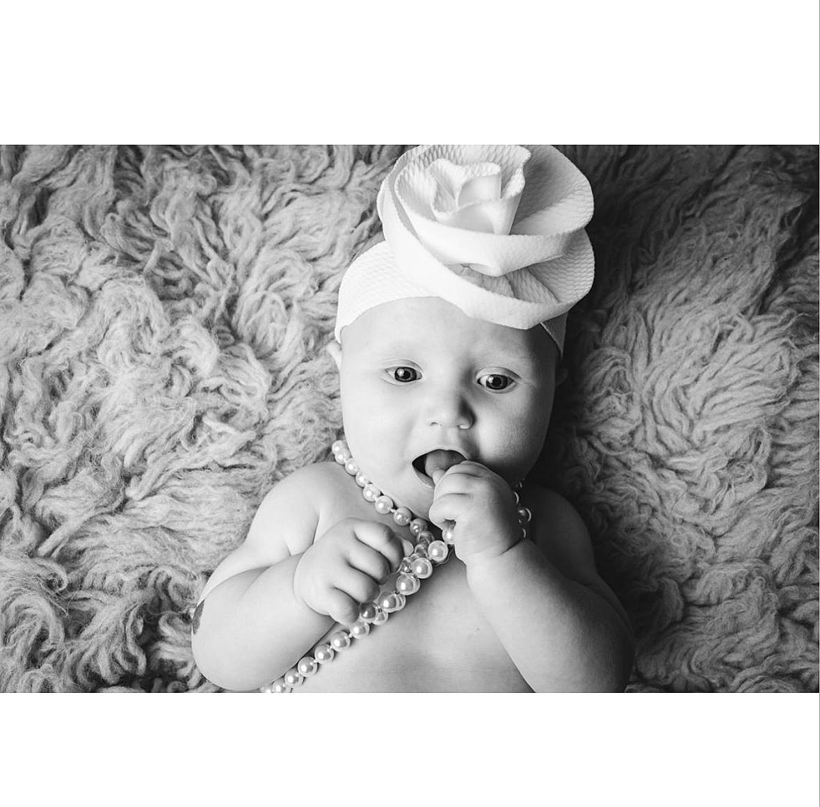 Scarlett joined the competition — help win amazing prizes! baby, baby_toddler_clothing, beanie, cap, child, costume_hat, fashion_accessory, flash_photography, grass, happy, headband, headpiece, headwear, knit_cap, monochrome, monochrome_photography, pattern, person, portrait_photography, stock_photography