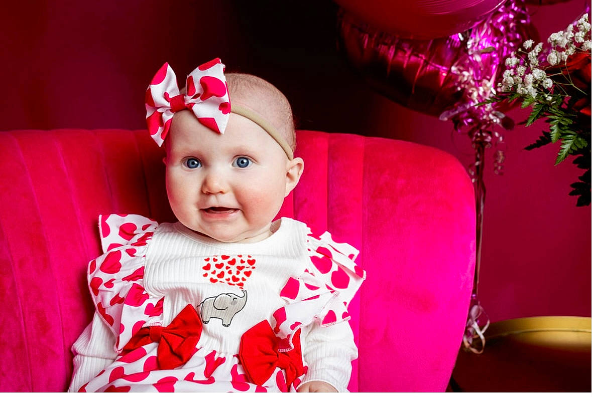Scarlett joined the competition — help win amazing prizes! baby, baby_toddler_clothing, beauty, costume_hat, decoration, event, fun, happy, headgear, headwear, holiday, magenta, person, pink, plant, purple, red, room, sleeve, smile