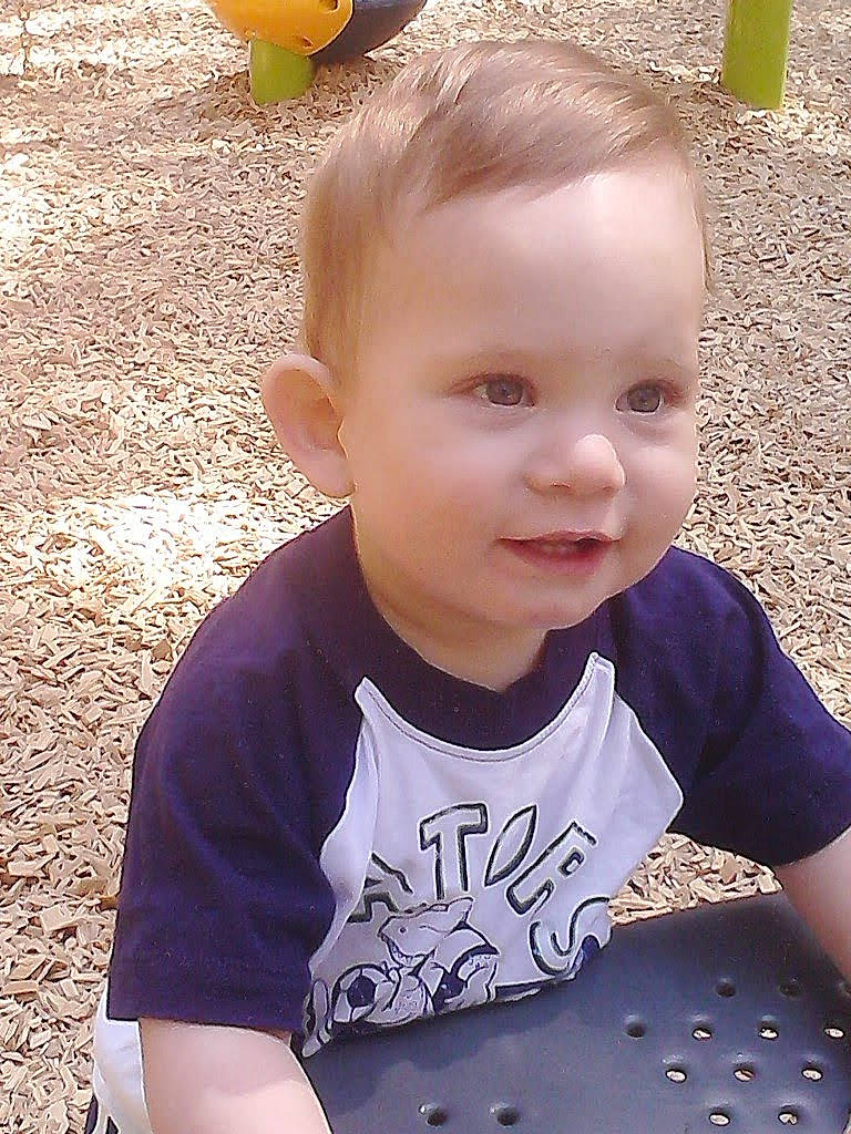 Landon joined the competition — help win amazing prizes! baby, baby_toddler_clothing, cheek, chin, cool, eye, face, grass, hair, happy, iris, light, mouth, nose, organ, person, skin, sleeve, smile, t_shirt