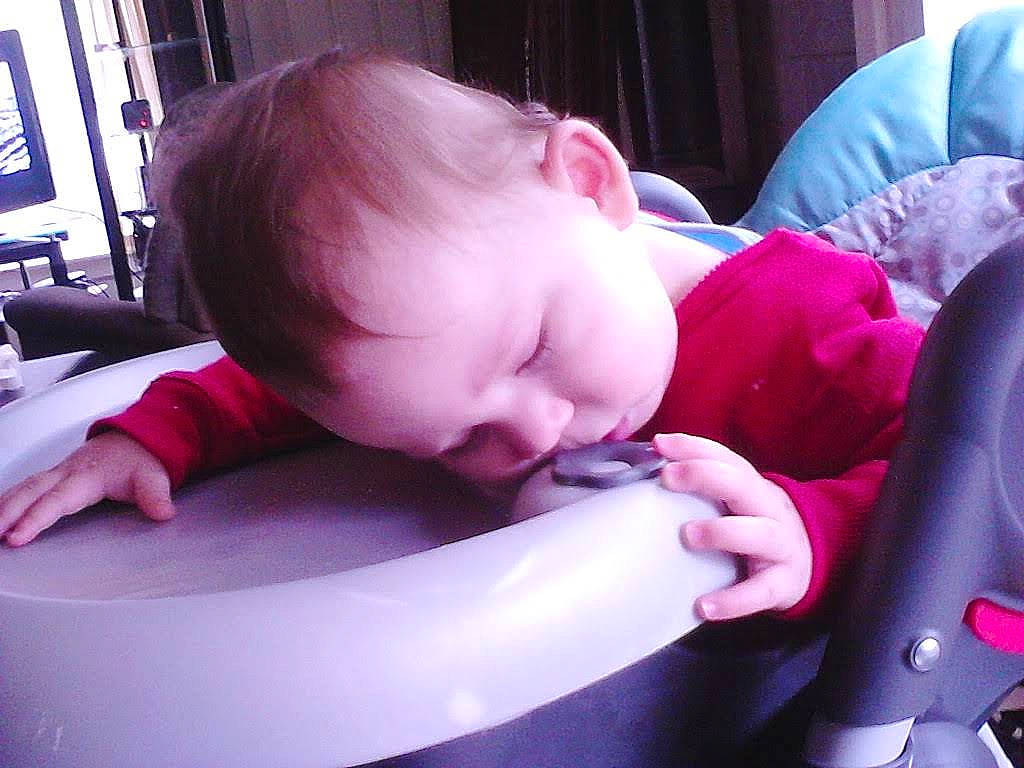 Landon is registered to the contest to win money with this photo: baby, baby_products, baby_toddler_clothing, cheek, child, comfort, ear, eyelash, finger, fun, happy, magenta, mouth, nose, person, pink, product, purple, sitting, skin