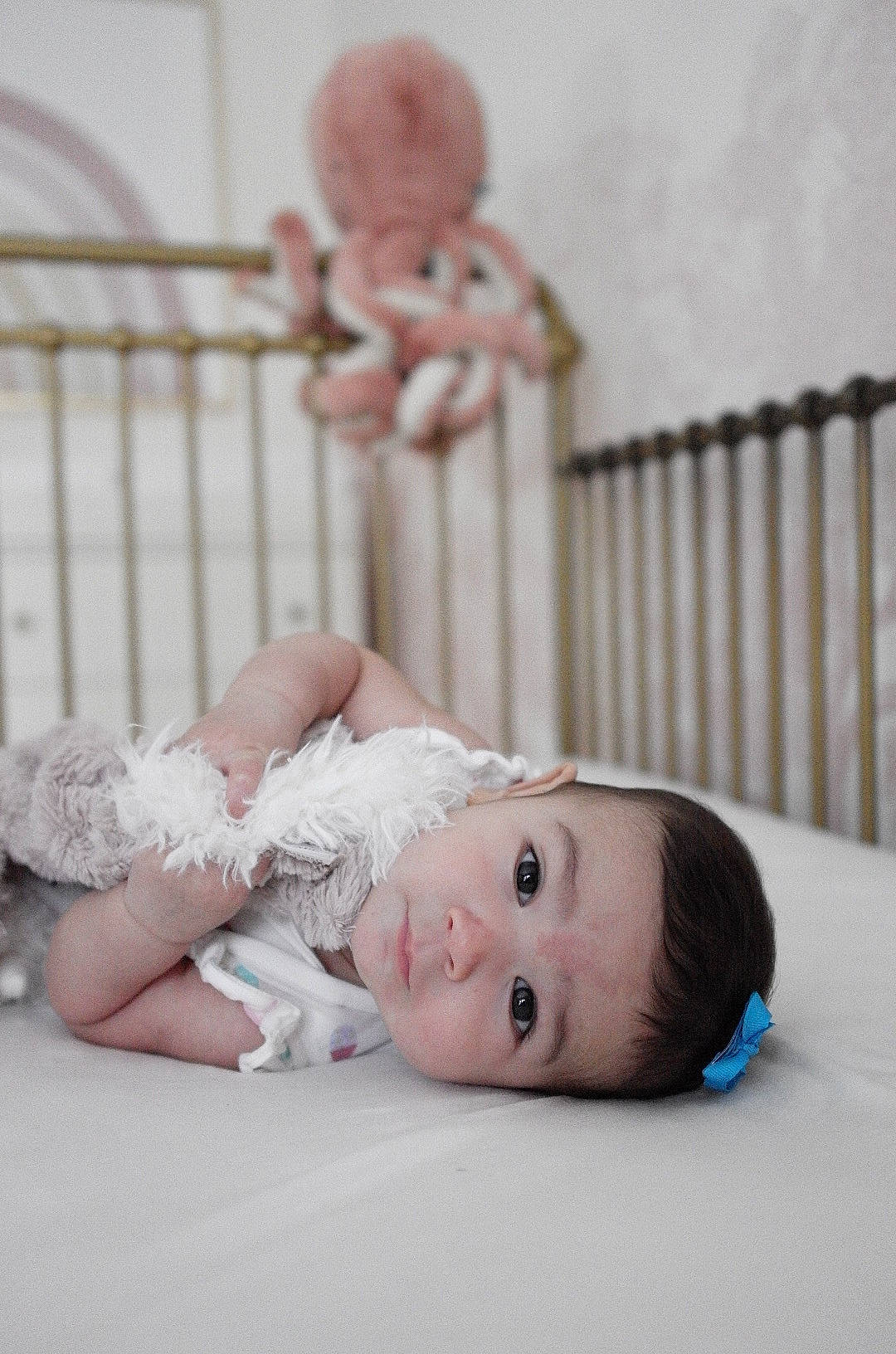 Colette is registered to the contest to win money with this photo: baby, baby_sleeping, baby_toddler_clothing, bed, child, comfort, dress, flash_photography, flooring, furniture, happy, human_body, infant_bed, leg, product, sitting, skin, toddler, toy, wood