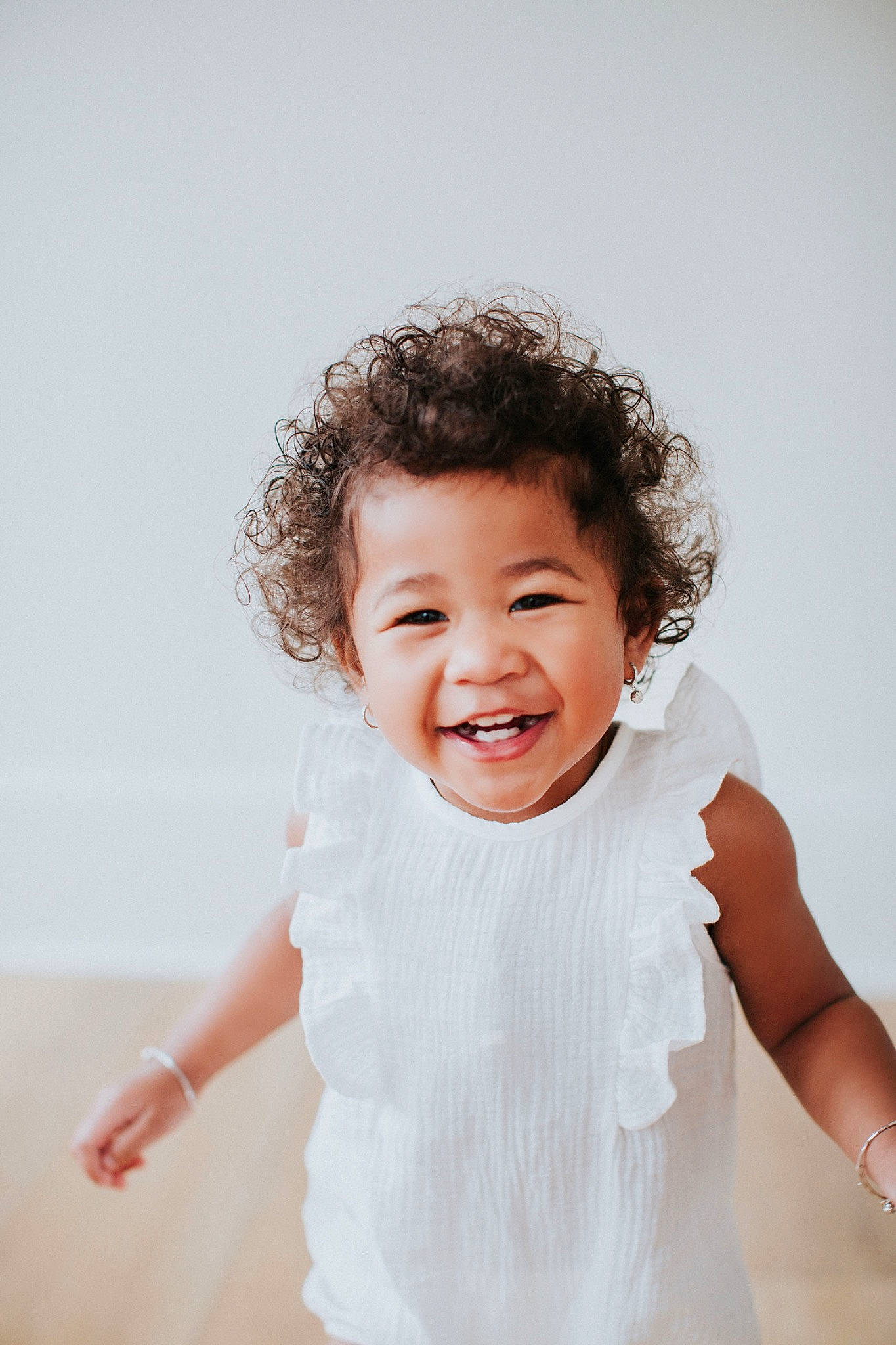 Naveah is registered to the contest to win money with this photo: abdomen, baby, baby_toddler_clothing, chin, comfort, elbow, eye, eyebrow, face, flash_photography, gesture, happy, human_body, joy, lip, neck, person, skin, sleeve, smile