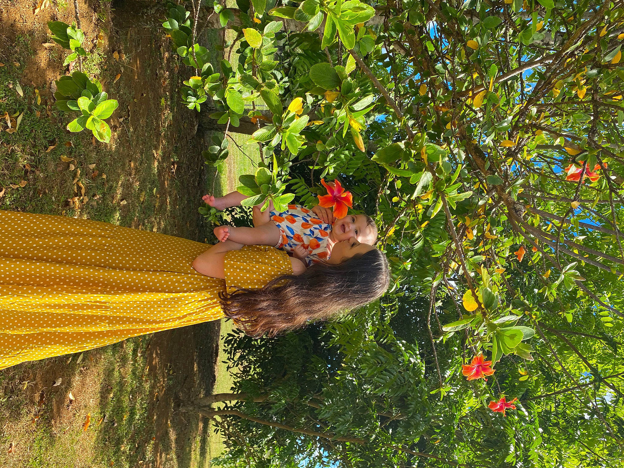 Mia is registered to the contest to win money with this photo: art, flowering_plant, fruit, garden, grass, leaf, people_in_nature, person, plant, shrub, terrestrial_plant, tree, trunk, vegetation