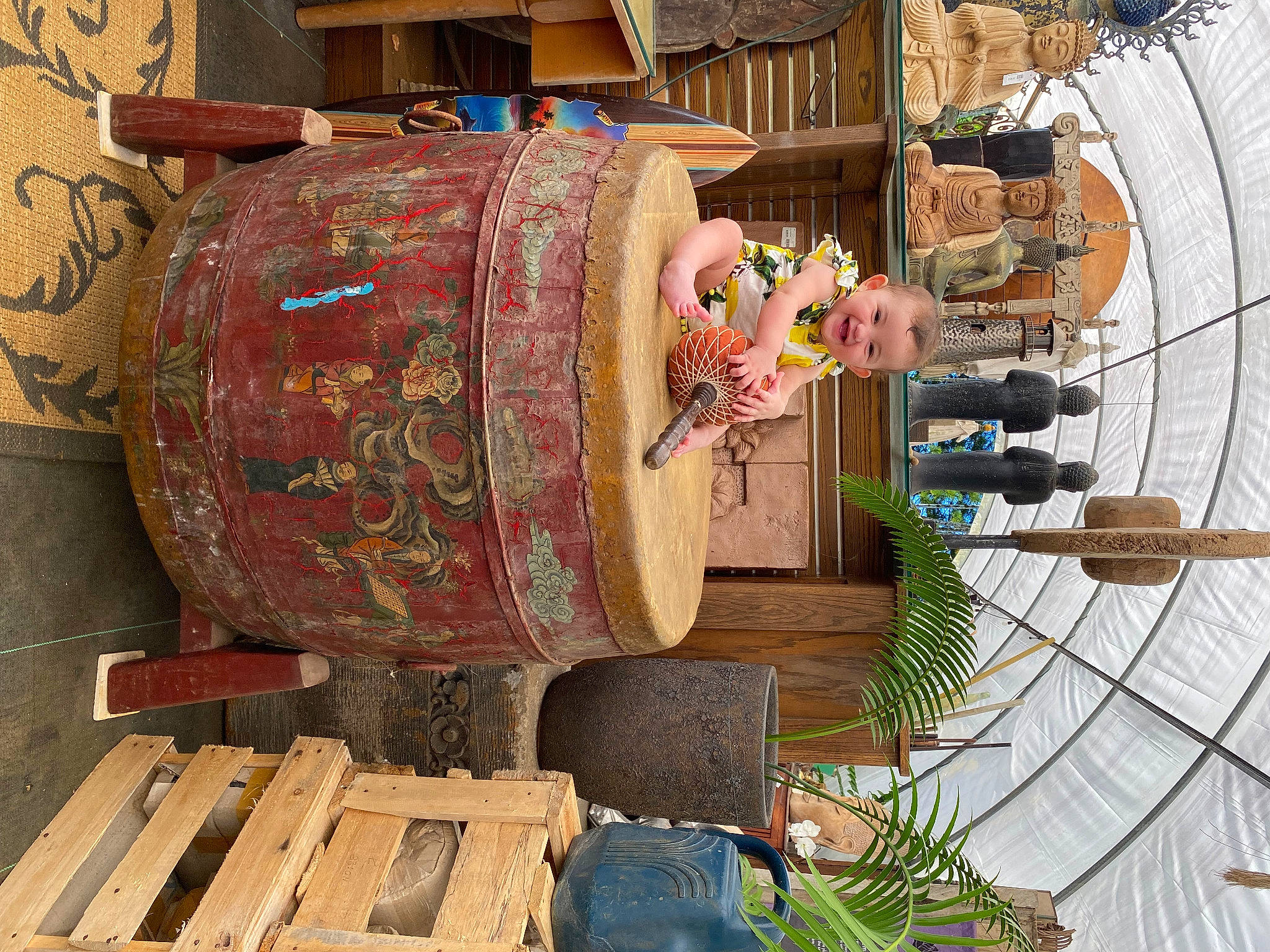 Mia joined the competition — help win amazing prizes! art, building, drum, flowerpot, joy, machine, membranophone, musical_instrument, person, plant, urban_design, wood