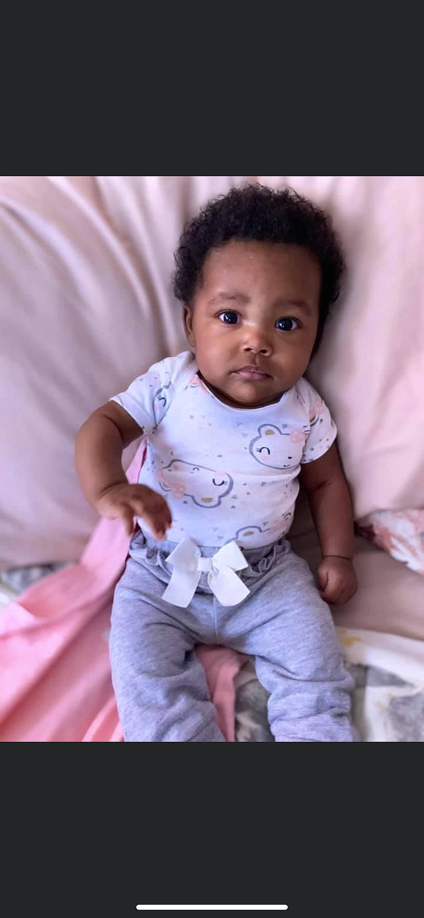 Jaionna is registered to the contest to win money with this photo: baby, baby_products, baby_toddler_clothing, cheek, child, comfort, linens, nightwear, person, pink, skin, sock, toddler