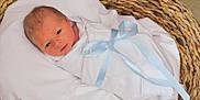 David joined the competition — help win amazing prizes! newborn, baby, infant, wrapped, blanket, blue_ribbon, basket, woven, cozy, resting, sleepy, cute, soft, white, portrait, child, infancy, peaceful, baby_boy, newborn_baby