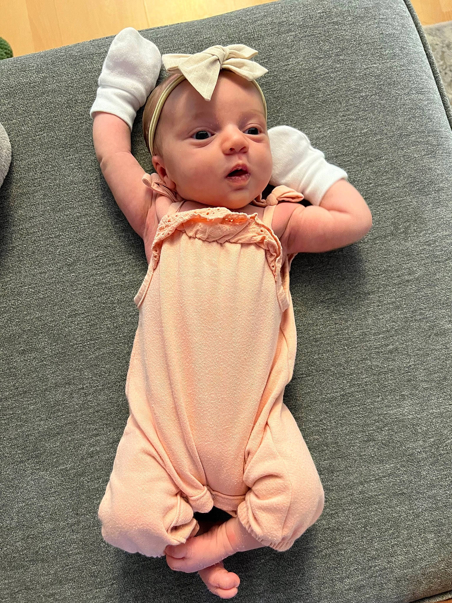 Addy joined the competition — help win amazing prizes! arm, baby, baby_toddler_clothing, cheek, child, collar, comfort, eye, face, flooring, foot, gesture, leg, pattern, person, sitting, skin, sleeve, textile, thumb