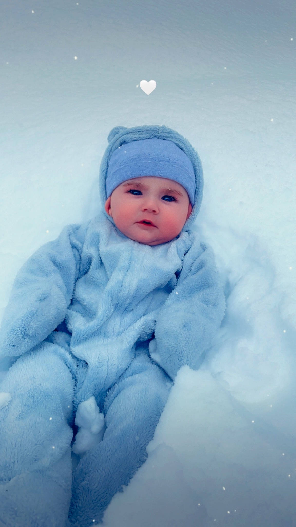Kailani is registered to the contest to win money with this photo: baby, baby_toddler_clothing, beanie, cap, electric_blue, eye, flash_photography, freezing, fur, happy, hat, head, headwear, hood, knit_cap, outerwear, person, playing_in_the_snow, portrait_photography, snow