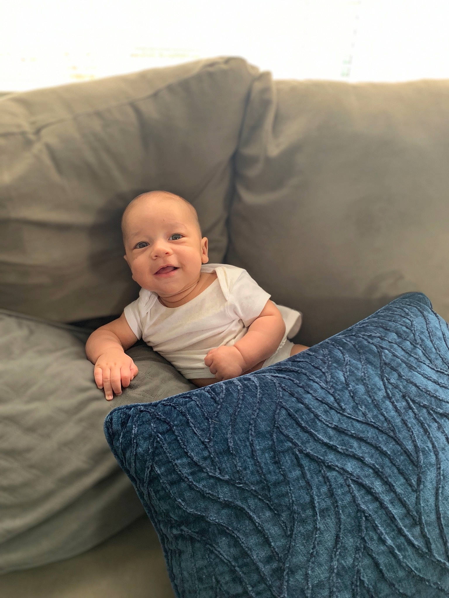 Karmello joined the competition — help win amazing prizes! baby, baby_toddler_clothing, child, comfort, couch, finger, flash_photography, flooring, fun, human_leg, lap, linens, person, room, sitting, skin, sleeve, t_shirt, throw_pillow, toddler