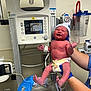 Chaseton joined the competition — help win amazing prizes! baby, bed, blanket, blue_gloves, crying, device, diaper, gloves, healthcare, hospital, infant, medical_equipment, monitor, neonatal, newborn, person, plastic_bag, sleeve, umbilical_cord, white_wall