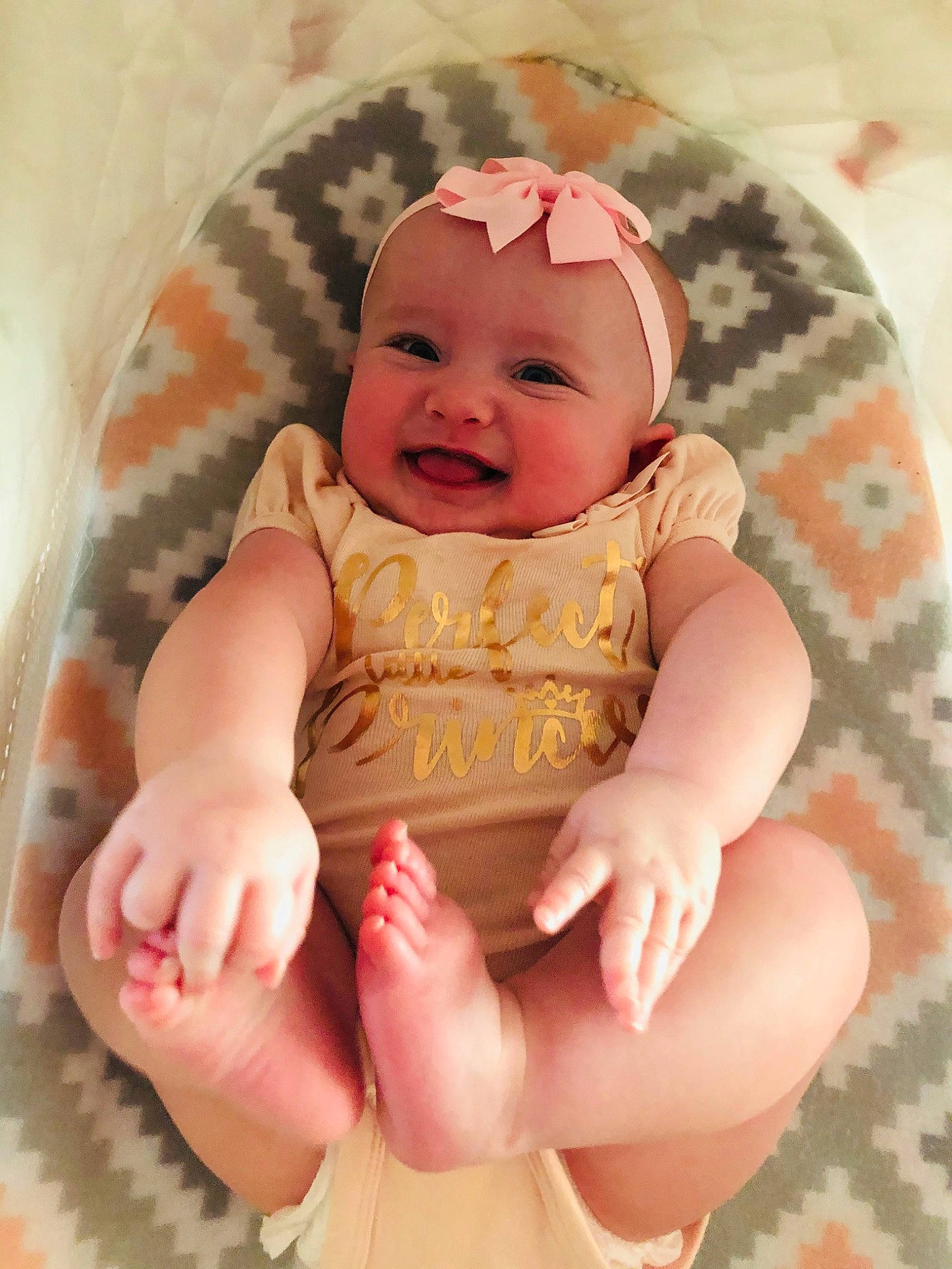 Lilly Farris is registered to the contest to win money with this photo: baby, baby_products, baby_toddler_clothing, cheek, child, finger, hand, headwear, mouth, person, pink, product, skin, toddler