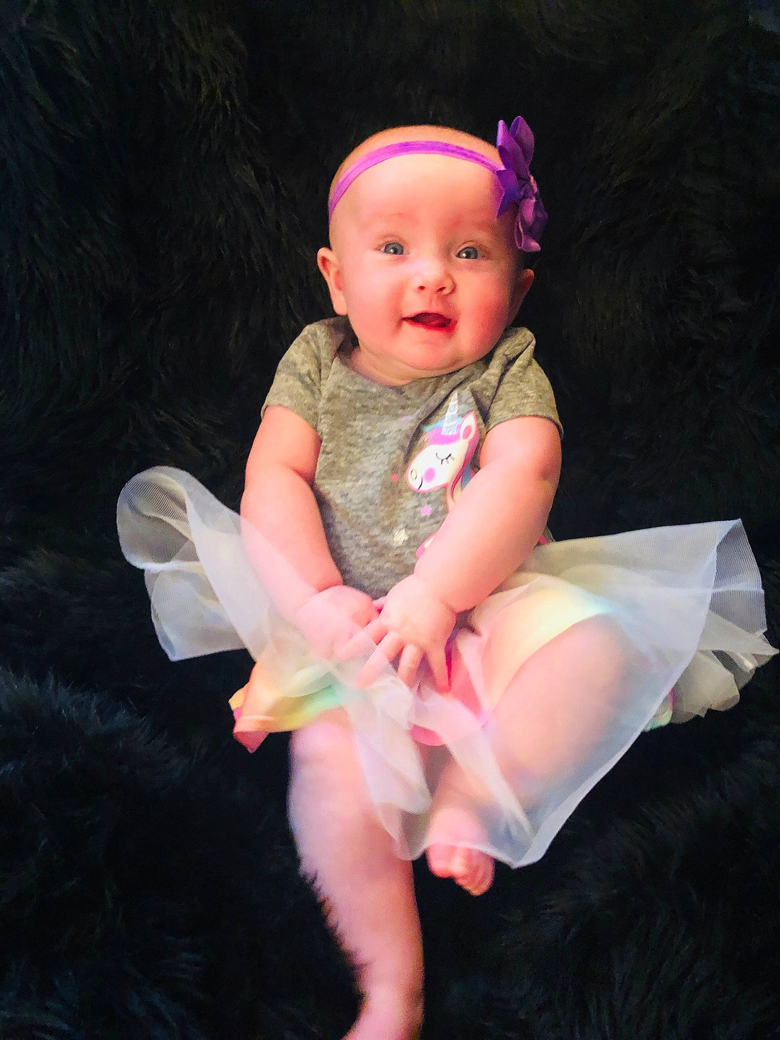 Lilly Farris is registered to the contest to win money with this photo: baby, baby_toddler_clothing, ballet_tutu, child, costume, fun, headgear, headwear, person, pink, sitting, smile, toddler