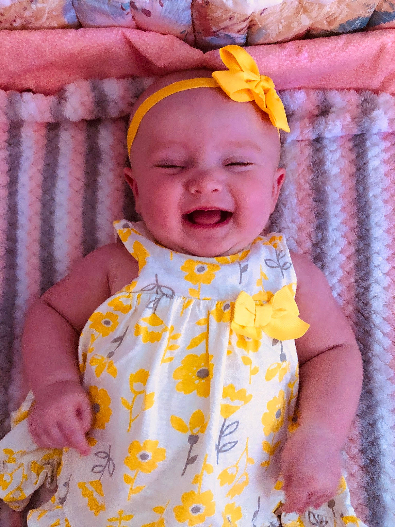Lilly Farris is registered to the contest to win money with this photo: baby, baby_toddler_clothing, cheek, child, face, head, orange, pattern, person, skin, smile, textile, toddler, yellow