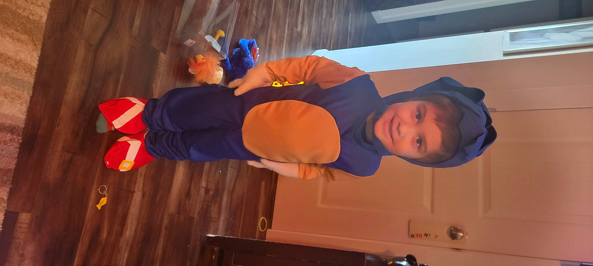 Xander joined the competition — help win amazing prizes! baseball_cap, elbow, electric_blue, fun, happy, hardwood, hat, joy, leisure, orange, person, room, smile, wood