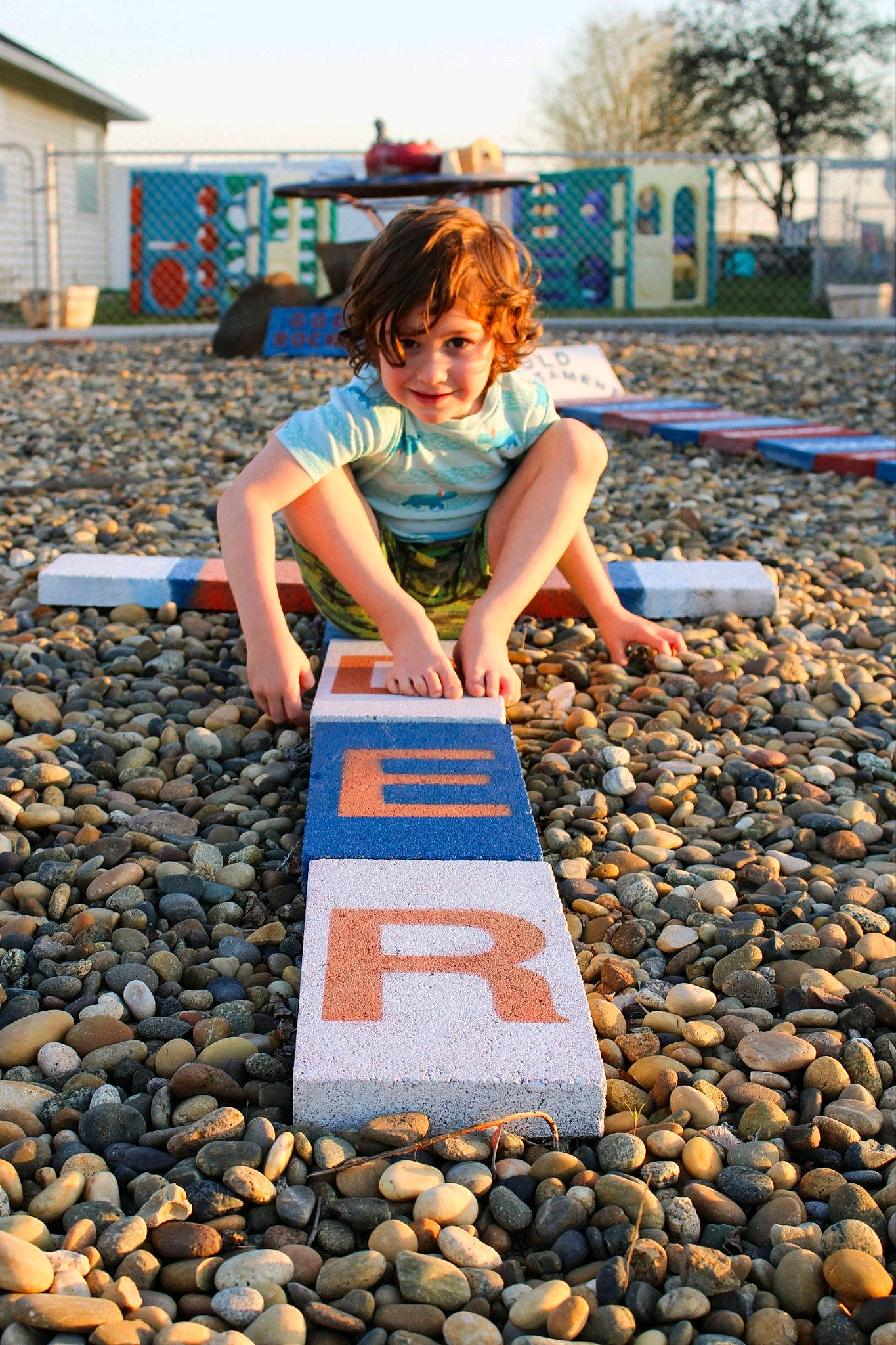 Xander is registered to the contest to win money with this photo: child, city, electric_blue, flooring, fun, happy, human, joy, landscape, leisure, morning, person, public_space, recreation, sky, soil, summer, t_shirt, toddler, travel