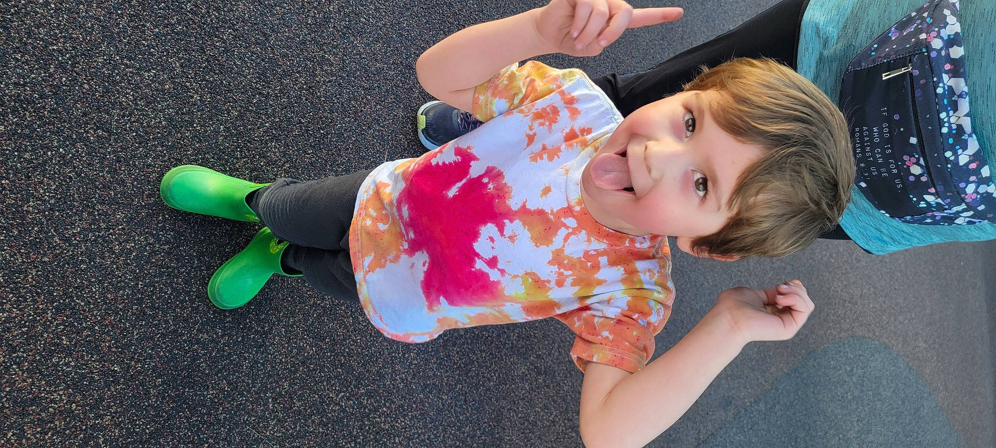 Xander is registered to the contest to win money with this photo: baby_toddler_clothing, child, finger, flooring, foot, fun, happy, human_leg, knee, leisure, pattern, person, play, sitting, skin, sleeve, smile, sock, t_shirt, thigh