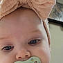 baby, child, face, headband, bow, pacifier, indoor, clothing, white, gold, stars, cute, infant, portrait, closeup, expression, soft_light, skin, young, person