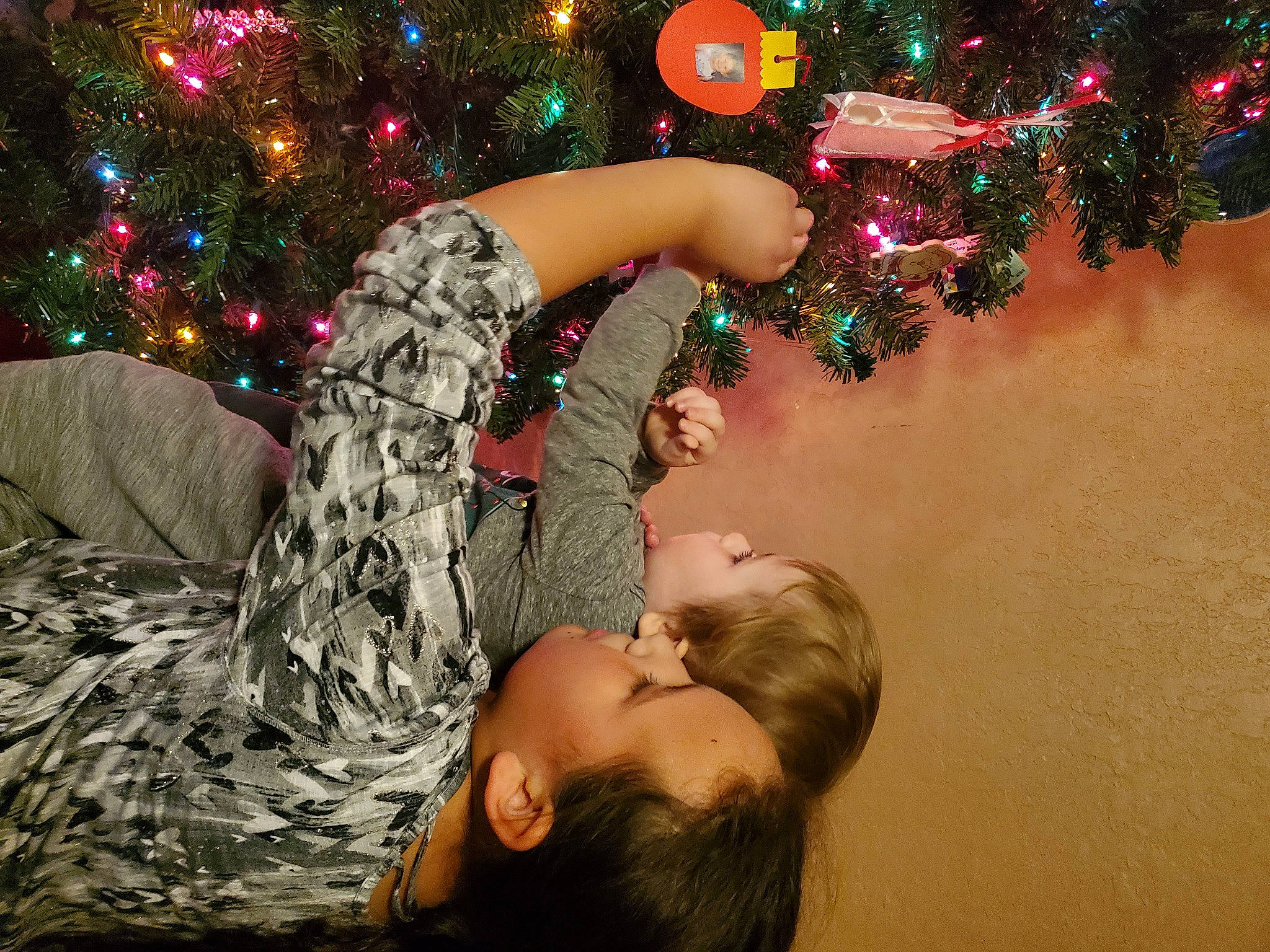 Penelope joined the competition — help win amazing prizes! christmas, christmas_decoration, christmas_eve, christmas_ornament, christmas_tree, event, flash_photography, fun, gesture, happy, holiday, holiday_ornament, human_body, organ, ornament, party_supply, people_in_nature, person, plant, tree