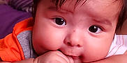 Darkiel joined the competition — help win amazing prizes! baby, child, face, hands, indoor, curtain, furniture, cozy, resting, cute, portrait, person, closeup, chubby_cheeks, looking, casual_clothing, soft_lighting, expression, hair, skin