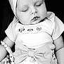 Ilona a rejoint le concours — aidez-le/la à gagner de superbes lots ! baby, sleeping, headband, bow, beads, toy, skirt, floral, infant, child, cute, peaceful, portrait, monochrome, clothing, hand, face, closed_eyes, person, resting