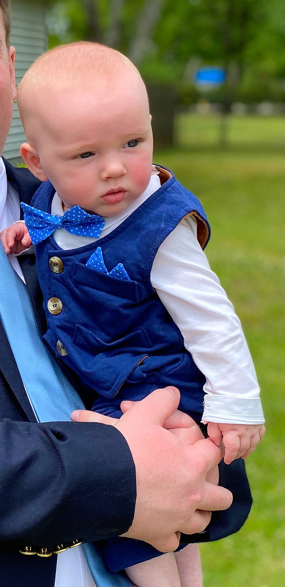 Jax is registered to the contest to win money with this photo: baby, baby_products, child, child_model, electric_blue, gesture, outerwear, person, product, toddler