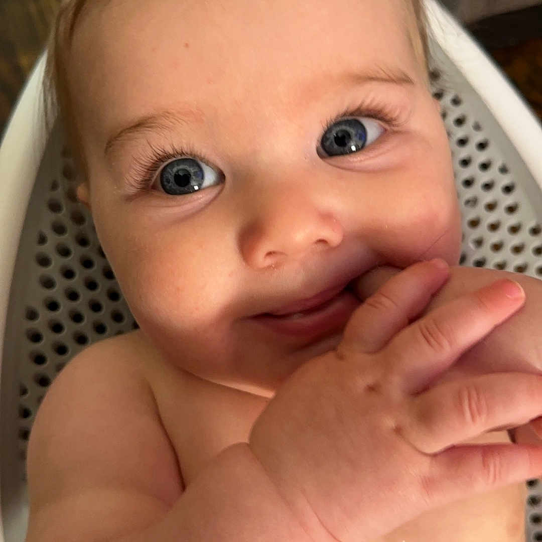 Phoenix joined the competition — help win amazing prizes! baby, bathing, bathtub, bodypart, crib, face, finger, hand, happy, head, indoors, mouth, newborn, person, photography, portrait, smile, teeth, tub, wrist