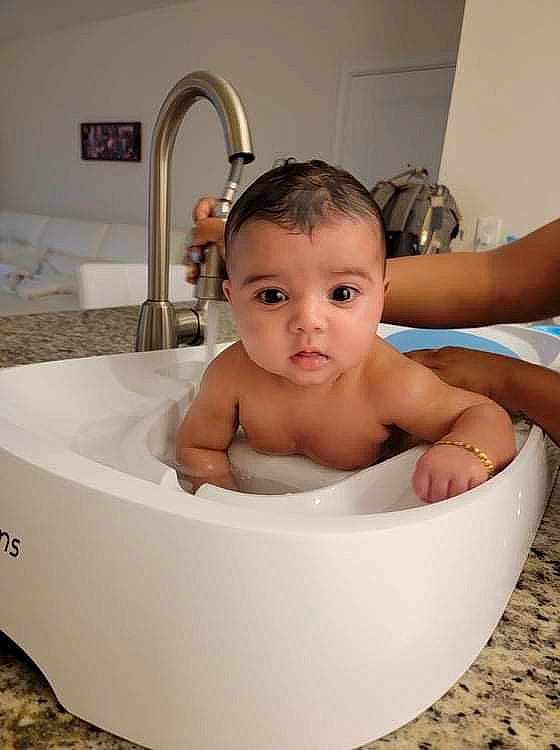 Gia joined the competition — help win amazing prizes! baby, baby_bathing, bathing, bathroom, bathtub, beauty, cheek, chest, child, ear, fluid, fun, person, plumbing, plumbing_fixture, sink, skin, smile, tap, toddler