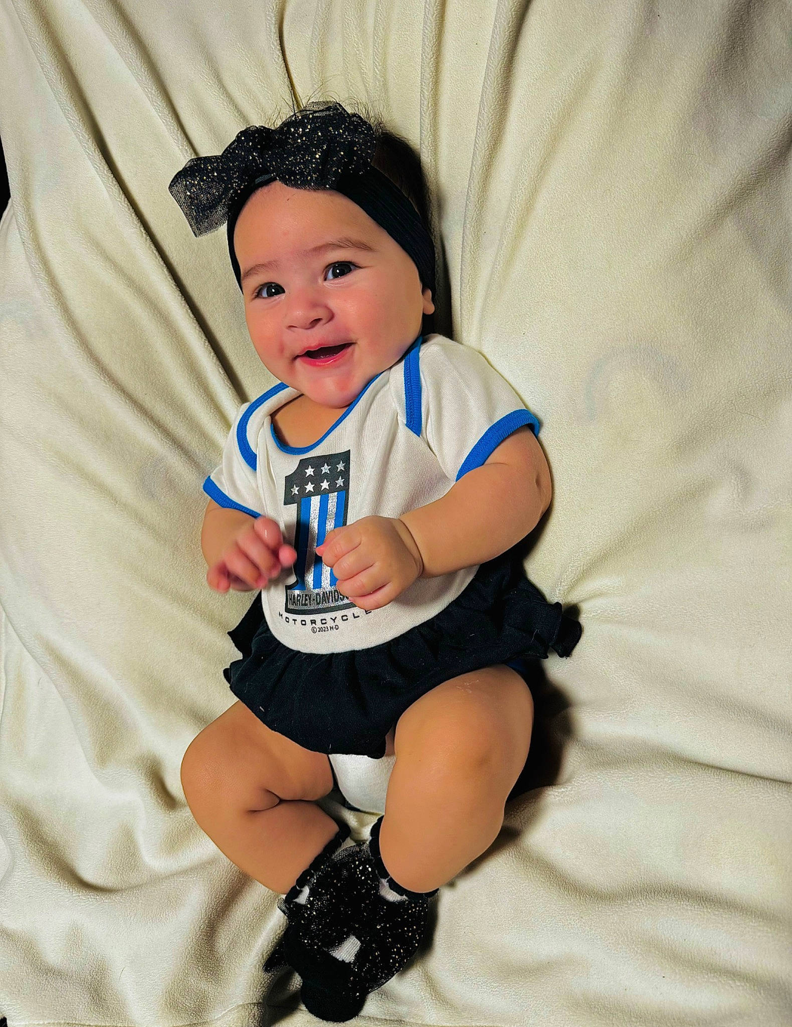 Kehlani is registered to the contest to win money with this photo: arm, baby, baby_toddler_clothing, child, cool, electric_blue, eye, finger, flash_photography, fun, happy, headwear, leg, person, shorts, sleeve, smile, sportswear, t_shirt, textile