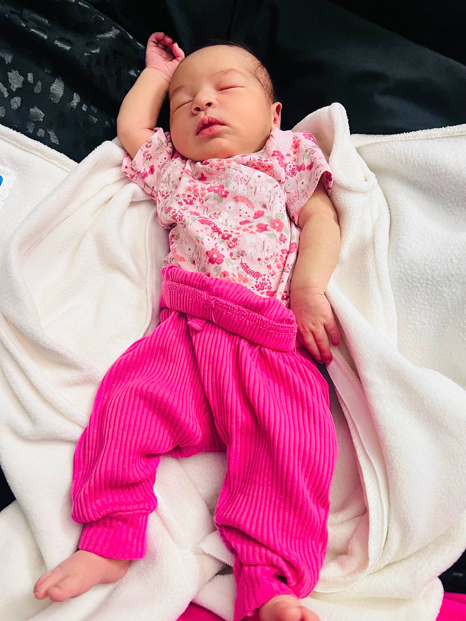 Kehlani is registered to the contest to win money with this photo: baby, baby_products, baby_safety, baby_sleeping, baby_toddler_clothing, bedding, cheek, child, collar, comfort, foot, linens, magenta, pattern, person, pink, sitting, skin, sleeve, sock