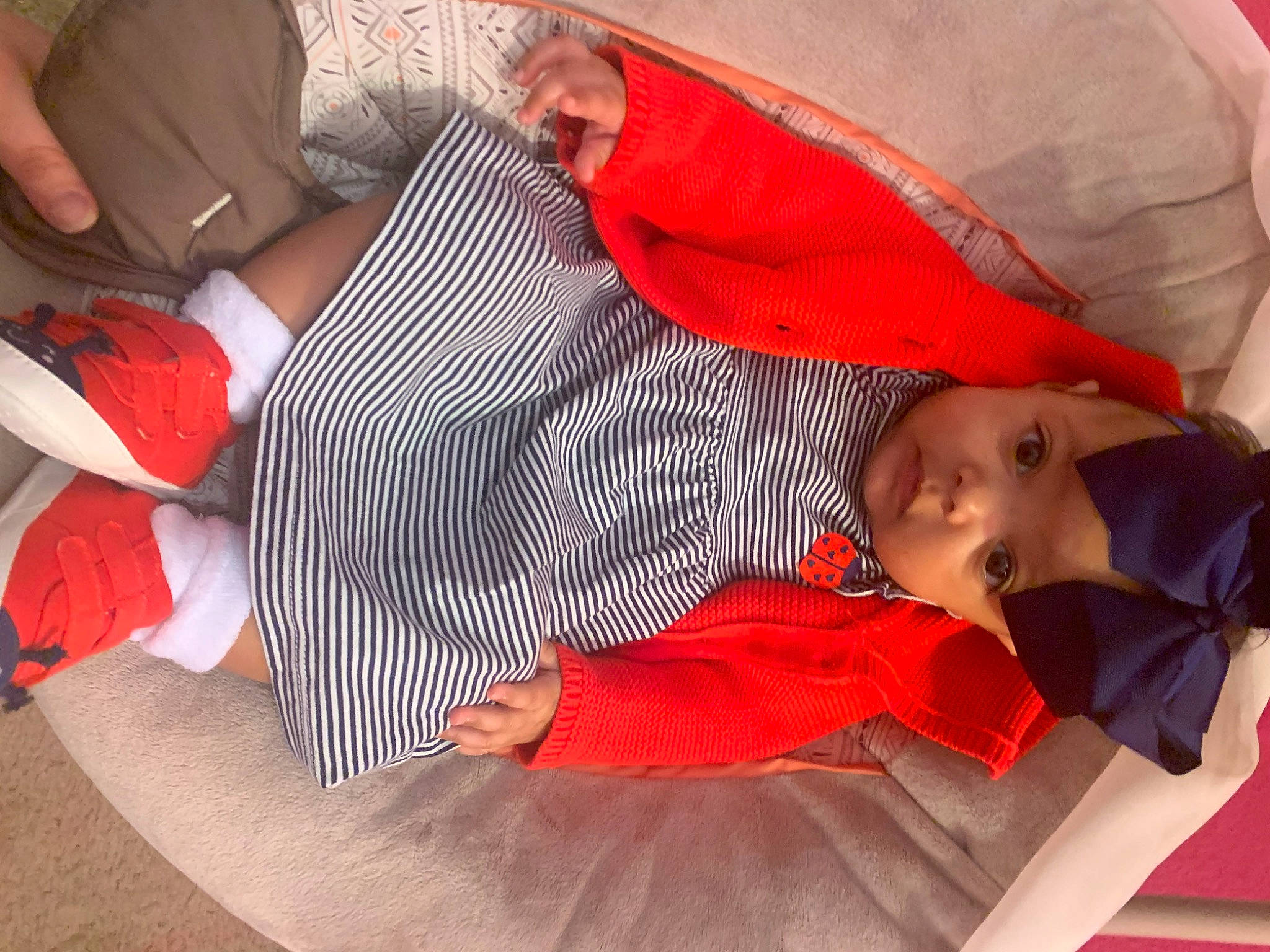 Audrianna joined the competition — help win amazing prizes! baby, child, comfort, nap, orange, person, red, sitting, sleep, toddler