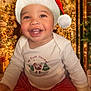 Dj Civils is registered to the contest to win money with this photo: baby, child, santa_hat, christmas, holiday, festive, smiling, pajamas, indoors, decorations, ornaments, gifts, happy, portrait, cute, seasonal, celebration, joyful, festivity, christmas_tree